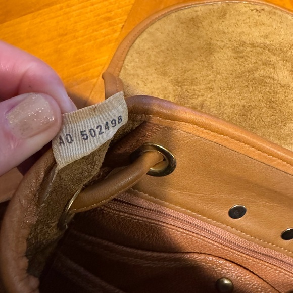 Dooney & Bourke tan pebbled leather drawstring backpack - Picture 5 of 11